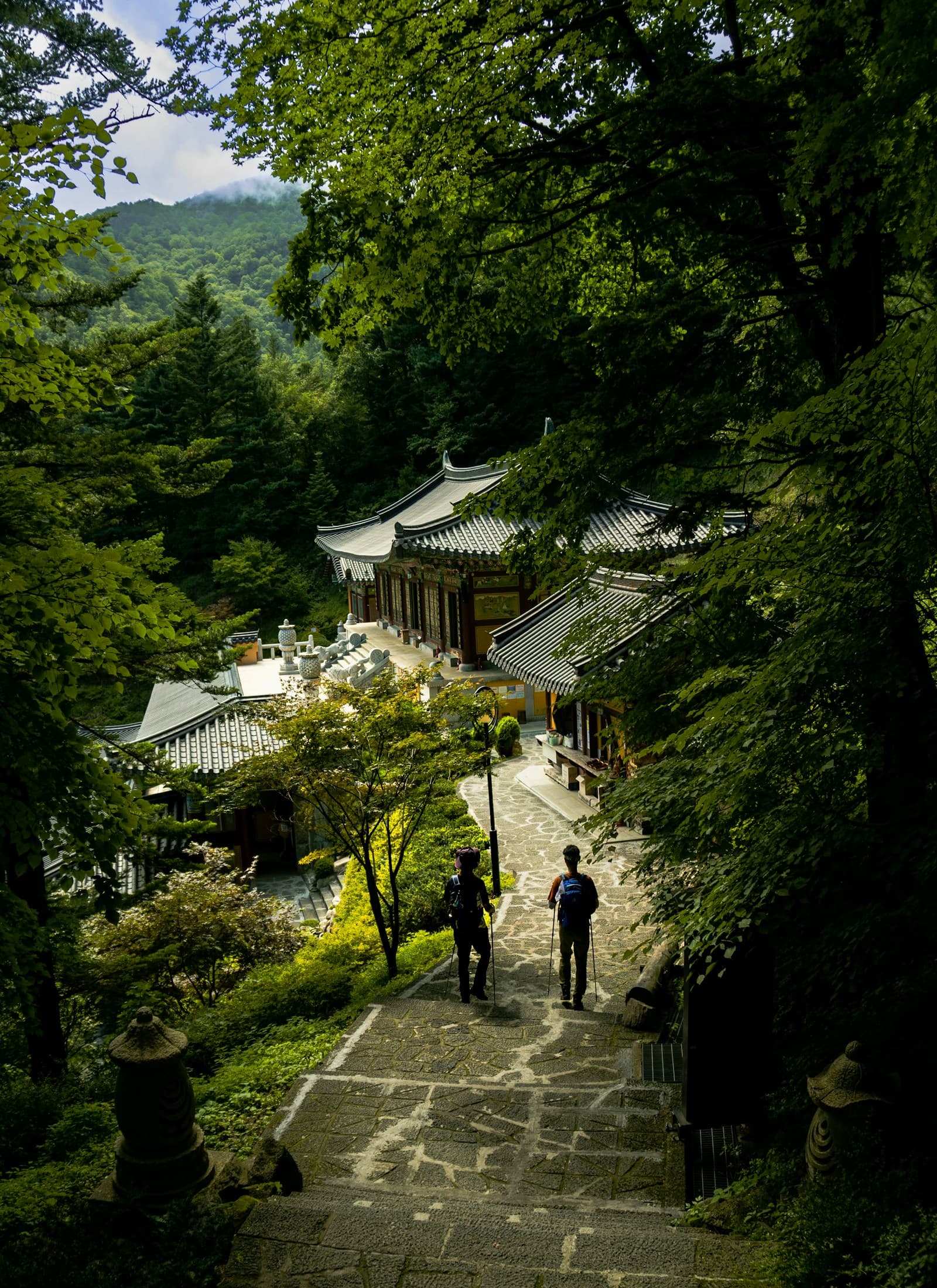 Couple walking down a stone path