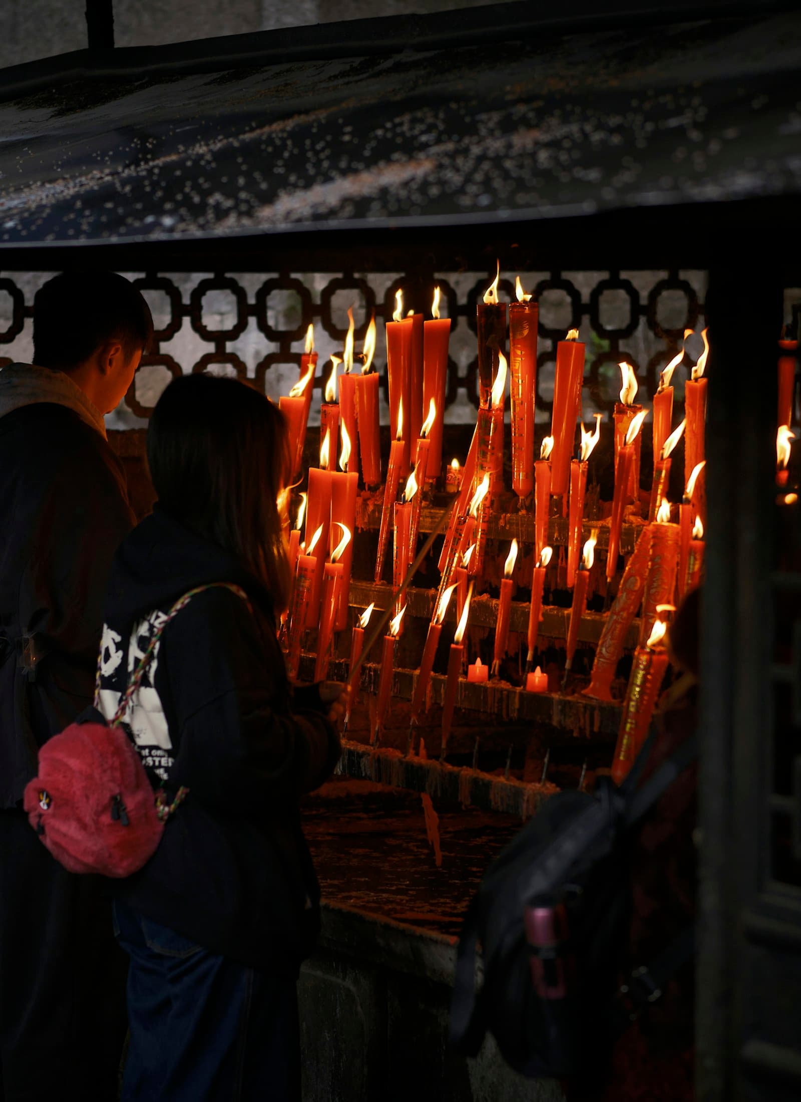 Couple standing close outdoors